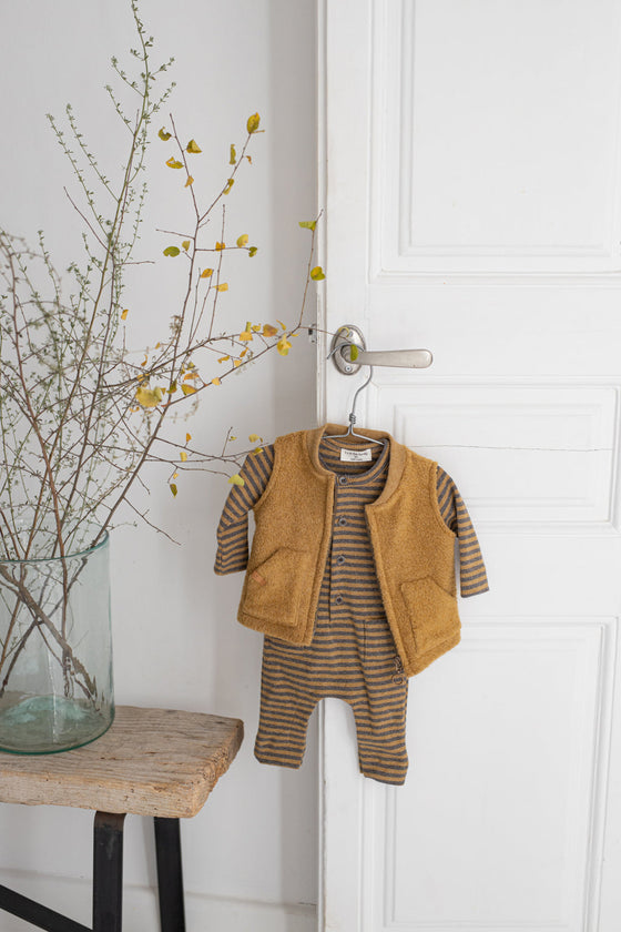 1 more in the family TIMOT onesie ochre stripe