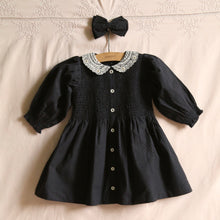  Black polka dot dress with matching hair clip