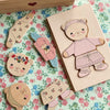 Konges Slojd WOODEN TEDDY DRESS UP PUZZLE DUSTY PINK